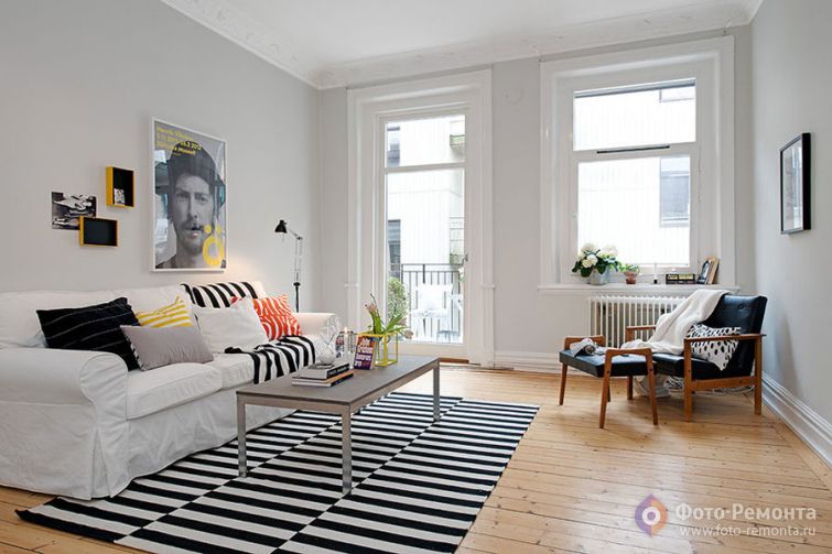 Бело-оранжевый интерьер квартиры в Швеции