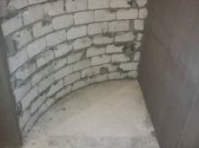 Стенка душевой кабинки из кирпича